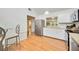 Bright kitchen with stainless steel appliances and an open view to the living space at 7926 Woodpointe Ct # 29, Sarasota, FL 34238