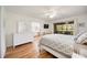 Bright main bedroom with ensuite bathroom and access to a screened-in patio at 7926 Woodpointe Ct # 29, Sarasota, FL 34238