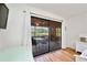 View of the screened patio from the main bedroom of the house at 7926 Woodpointe Ct # 29, Sarasota, FL 34238