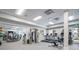 Spacious gym with treadmills, weight machines, and ample lighting for a great workout session at 8218 Genoa Blvd, Lakewood Ranch, FL 34202