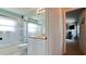 Bathroom with sliding glass shower doors at 9102 12Th Nw Ave, Bradenton, FL 34209