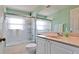 Bathroom with shower-tub combo and stylish fixtures at 9102 12Th Nw Ave, Bradenton, FL 34209