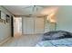 Spacious bedroom with large closets, neutral carpet, ceiling fan, and a large beanbag at 9102 12Th Nw Ave, Bradenton, FL 34209
