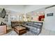 Comfortable open-concept living room with modern furnishings and seamless transition to the kitchen at 9102 12Th Nw Ave, Bradenton, FL 34209