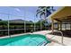 Inviting screened-in pool area perfect for outdoor entertaining and relaxation at 9102 12Th Nw Ave, Bradenton, FL 34209