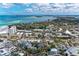 This aerial shot offers a stunning view of the community and the coastline at 101 Whispering Sands Dr # 307, Sarasota, FL 34242