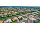 Community featuring canal-front homes with private boat docks and lush tropical landscaping at 105 Inlets Blvd # 105, Nokomis, FL 34275