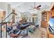 Open-concept living room showcasing high ceilings, comfortable seating, and stylish decor at 105 Inlets Blvd # 105, Nokomis, FL 34275