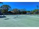 Well maintained community tennis courts with shade structure available for residents at 105 Inlets Blvd # 105, Nokomis, FL 34275