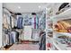 Walk-in closet that is well-organized and has ample storage space at 105 Inlets Blvd # 105, Nokomis, FL 34275