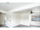 Bright bedroom featuring fresh paint, updated flooring and a ceiling fan at 115 41St Ne Ave, St Petersburg, FL 33703