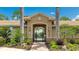 Welcoming entrance to the community featuring well-maintained landscaping and a gate to the pool area at 11625 Parrotfish St, Venice, FL 34292