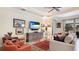 Inviting living room featuring a neutral palette, comfortable seating, and an entertainment center at 11625 Parrotfish St, Venice, FL 34292