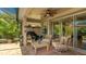 Spacious covered patio with comfortable seating, sliding glass doors, and a relaxing outdoor atmosphere at 11625 Parrotfish St, Venice, FL 34292