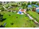 Aerial view of Central Park with park amenities, green spaces, playground, and walking paths at 12031 Longview Lake Cir, Lakewood Ranch, FL 34211