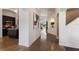 Inviting hallway connecting the kitchen to living areas, offering a glimpse of the home's open layout at 12031 Longview Lake Cir, Lakewood Ranch, FL 34211
