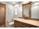 Inviting bathroom with a tiled walk-in shower, mosaic backsplash, and a custom vanity at 1207 71St Nw St, Bradenton, FL 34209