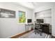Bright bedroom features a large window and ample desk and storage space at 1207 71St Nw St, Bradenton, FL 34209