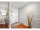 Bright entryway with wood floors, neutral walls, and decorative accents creating a welcoming ambiance at 1207 71St Nw St, Bradenton, FL 34209