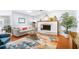 Comfortable living area showcasing a fireplace, neutral walls, and stylish furniture arrangement at 1207 71St Nw St, Bradenton, FL 34209