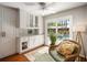Bright living area with custom cabinetry, wet bar, and sliding glass doors to the backyard pool at 1207 71St Nw St, Bradenton, FL 34209