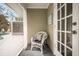 Cozy sunroom with wicker chair and pool view for relaxing afternoons at 1207 71St Nw St, Bradenton, FL 34209