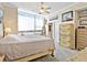 Cozy bedroom features a large window, soft lighting, and en suite bathroom at 1233 N Gulfstream Ave # 401, Sarasota, FL 34236