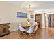 Chic dining room features a round table, chandelier, and elegant decor at 1233 N Gulfstream Ave # 401, Sarasota, FL 34236