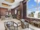 Elegant lobby featuring comfortable seating, marble floors, dark wood accents and bright natural light at 1233 N Gulfstream Ave # 401, Sarasota, FL 34236