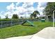 Fenced dog park with agility equipment, perfect for pets to exercise and socialize in a safe environment at 12331 Halfmoon Lake Ter, Bradenton, FL 34211