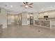 Spacious open-concept kitchen and living area perfect for modern living and entertaining with natural light at 12331 Halfmoon Lake Ter, Bradenton, FL 34211