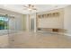 Open living area with sliding glass doors to a patio, neutral walls, and recessed lighting for a bright, airy feel at 12331 Halfmoon Lake Ter, Bradenton, FL 34211