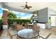 Outdoor grill area with seating, ideal for entertaining and enjoying the outdoors at 12331 Halfmoon Lake Ter, Bradenton, FL 34211
