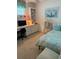 Comfortable bedroom featuring a built-in desk and shelving at 1350 N Portofino Dr # 402, Sarasota, FL 34242