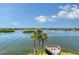 Panoramic aerial view of the waterfront community with a dock and island at 1350 N Portofino Dr # 402, Sarasota, FL 34242