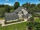 Charming two-story home with well-manicured lawn and landscaping, located near a scenic pond at 13514 4Th E Plz, Bradenton, FL 34212