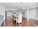 Open concept kitchen seamlessly connects to the dining area, complete with hardwood floors at 13514 4Th E Plz, Bradenton, FL 34212