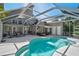 Inviting screened pool area with ample seating, perfect for outdoor entertaining at 13514 4Th E Plz, Bradenton, FL 34212