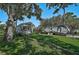 Beautiful putting green offers leisure with a view of the shed and RV; ideal for relaxation and recreation at 13514 4Th E Plz, Bradenton, FL 34212