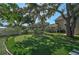 A well-manicured putting green provides a delightful recreational space in this serene outdoor setting at 13514 4Th E Plz, Bradenton, FL 34212