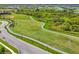 Community sports field with soccer goals along a walking path and green space at 16606 Barnwood Pl, Lakewood Ranch, FL 34211