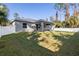 Backyard with a covered patio at 17113 Malta Ave, Port Charlotte, FL 33954