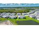 A picturesque community featuring modern homes, tranquil lakes, and verdant landscapes at 17715 Boracay Ct # 202, Venice, FL 34293