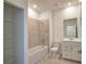 Bathroom featuring a bathtub, shower, and vanity with a sink at 17715 Boracay Ct # 202, Venice, FL 34293