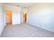 Spacious bedroom with carpet and walk-in closet, providing ample storage at 17715 Boracay Ct # 202, Venice, FL 34293