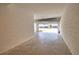Well-lit garage with ample space, featuring a clean concrete floor at 17715 Boracay Ct # 202, Venice, FL 34293