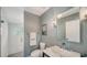 Modern bathroom features a glass-enclosed shower and sleek fixtures at 1774 Cherokee Dr, Sarasota, FL 34239
