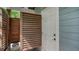 Exterior view of an outdoor shower space with wooden screen at 1774 Cherokee Dr, Sarasota, FL 34239