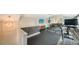Spacious gym area featuring high ceilings, modern equipment, and natural light at 1774 Cherokee Dr, Sarasota, FL 34239