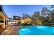 Stunning backyard with a pool, gazebo, and outdoor kitchen, perfect for entertaining guests at 1774 Cherokee Dr, Sarasota, FL 34239